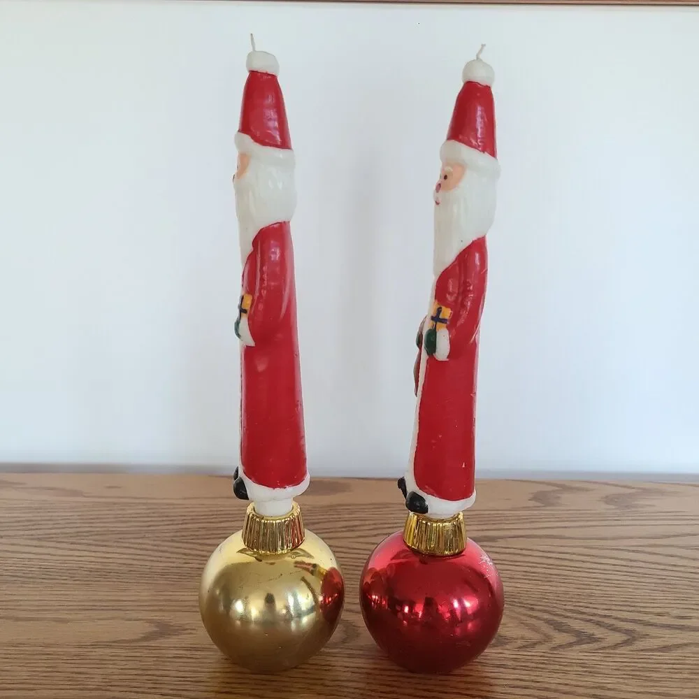Two Vintage Santa Claus Character Candles In Christmas Ornament Candle Holders